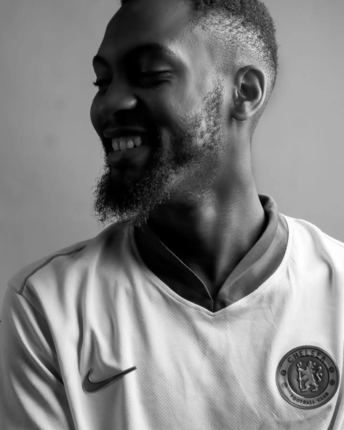 Portrait of photographer Adeleye Akindele holding a camera
